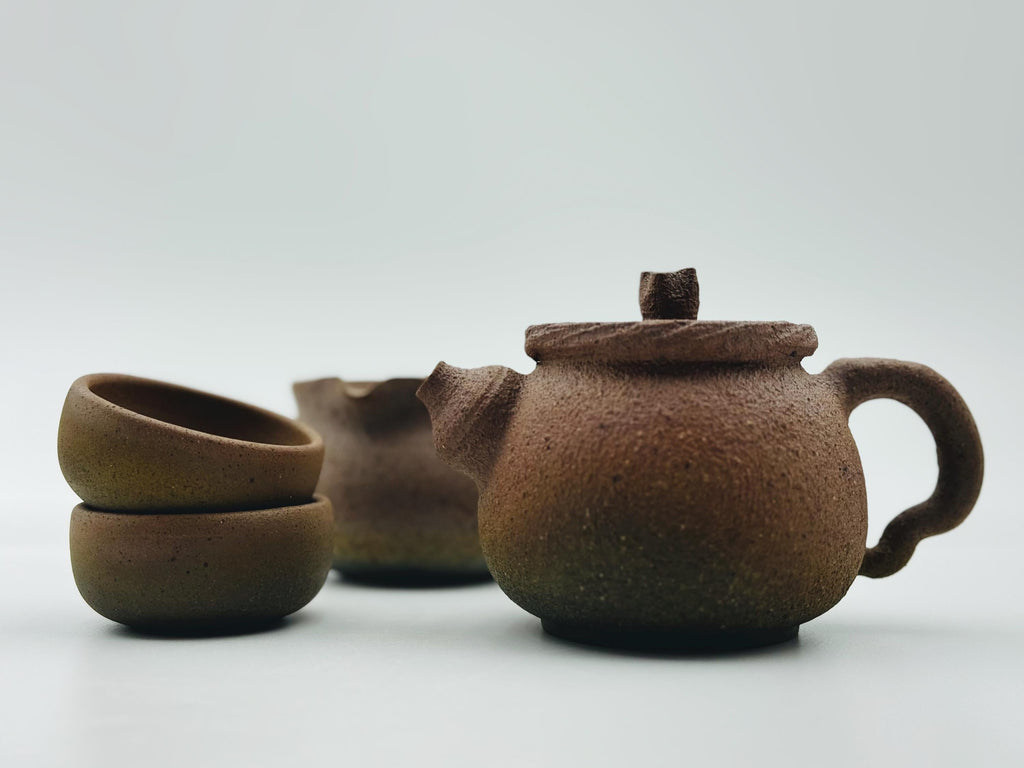 Handcrafted Ceramic Tea Cup: Unglazed Mantou Kiln, Earthy Tones